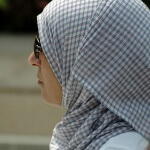A muslim woman wearing a hijab.